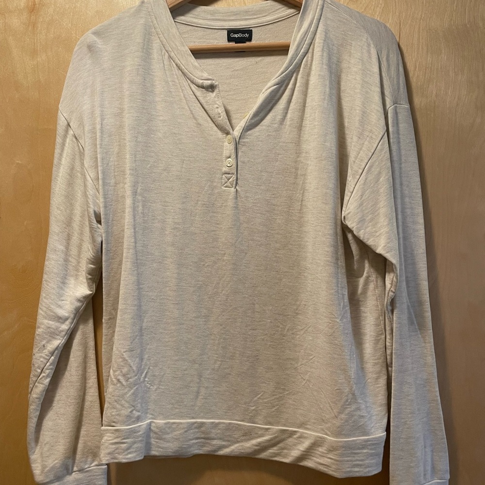 Lightly worn, super soft sleep shirt, with button details.